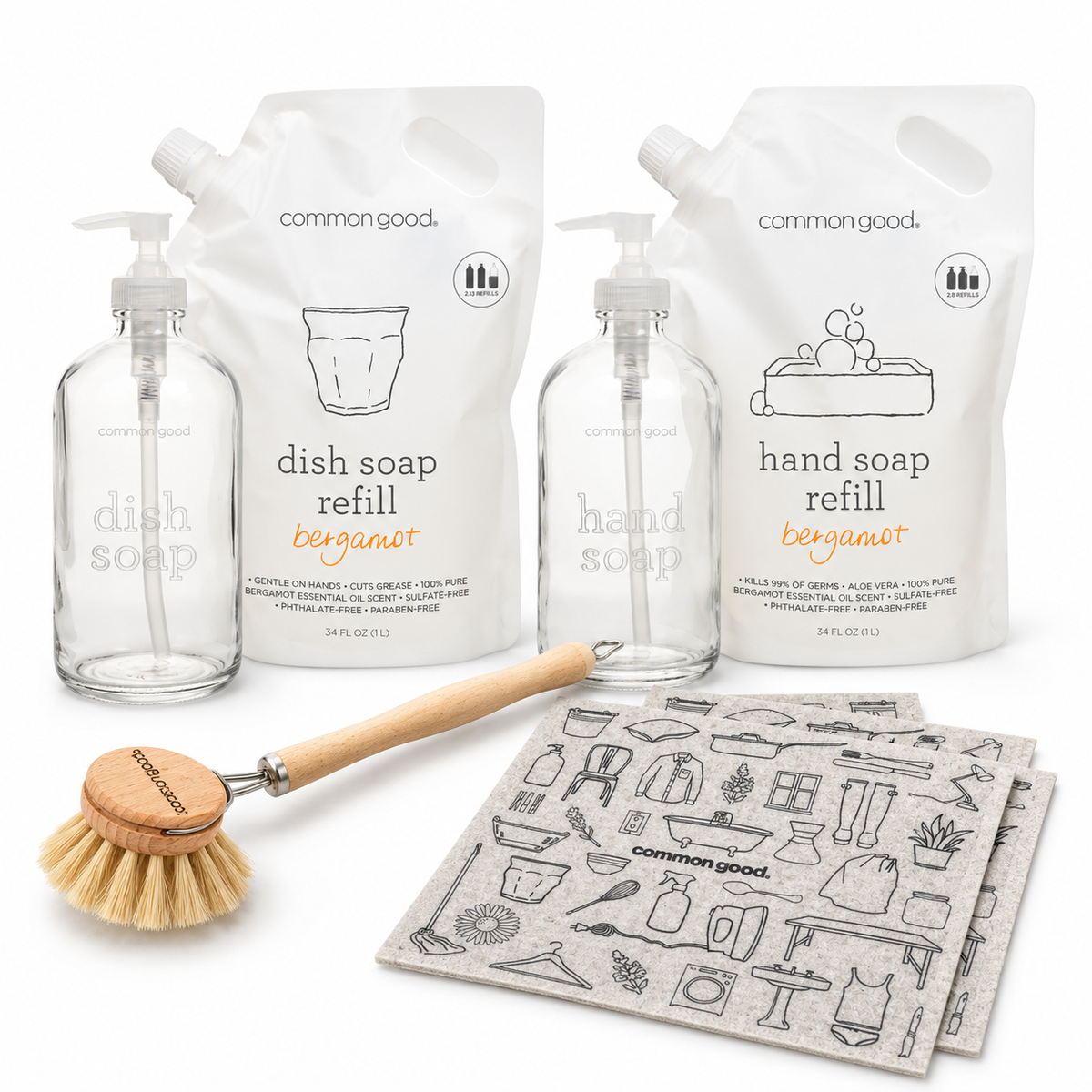 Common Good Sink Essentials Bundle with dish soap and hand soap refill pouches and glass bottles, one dish brush, and two Swedish cloths