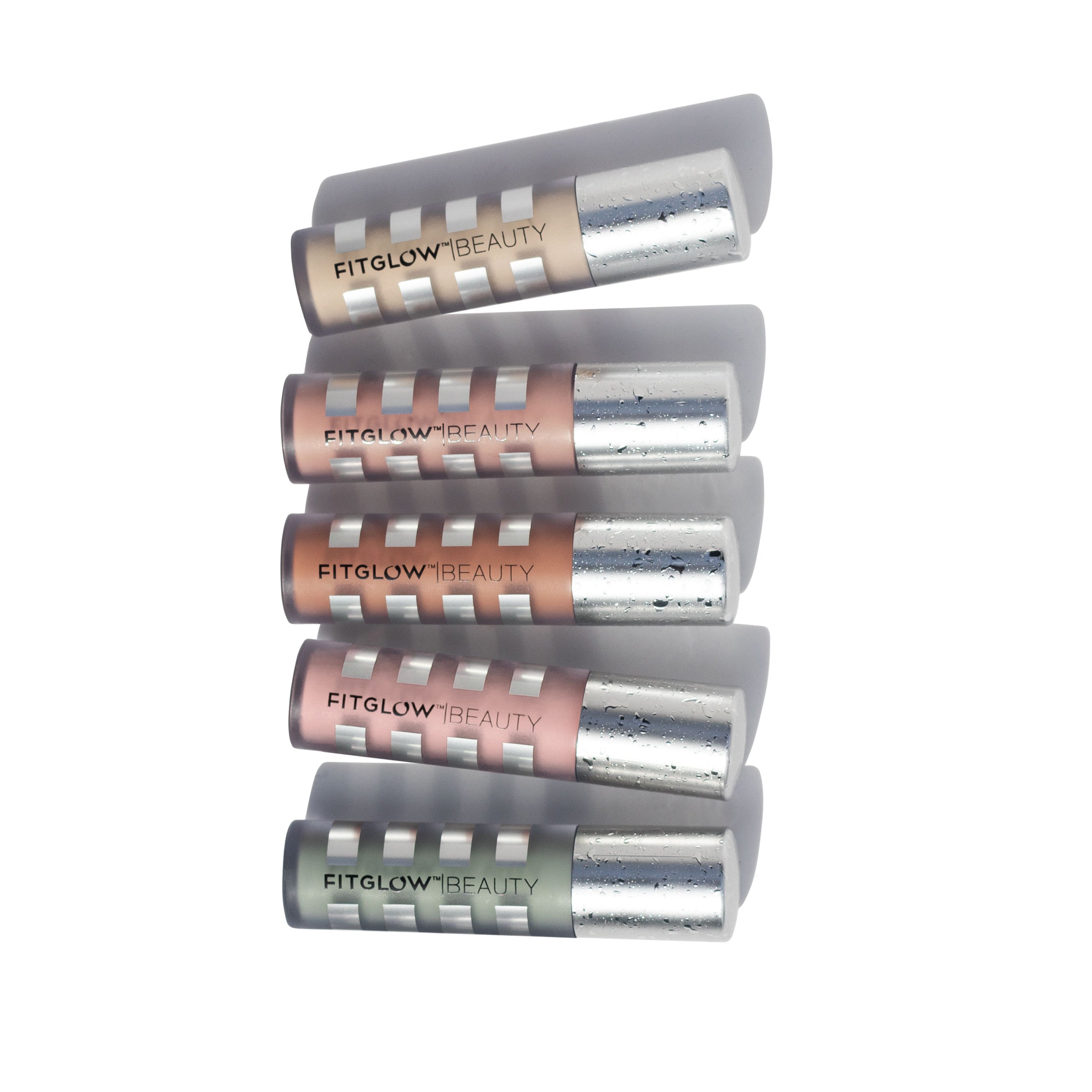 Five Fitglow beauty products stacked on a white background