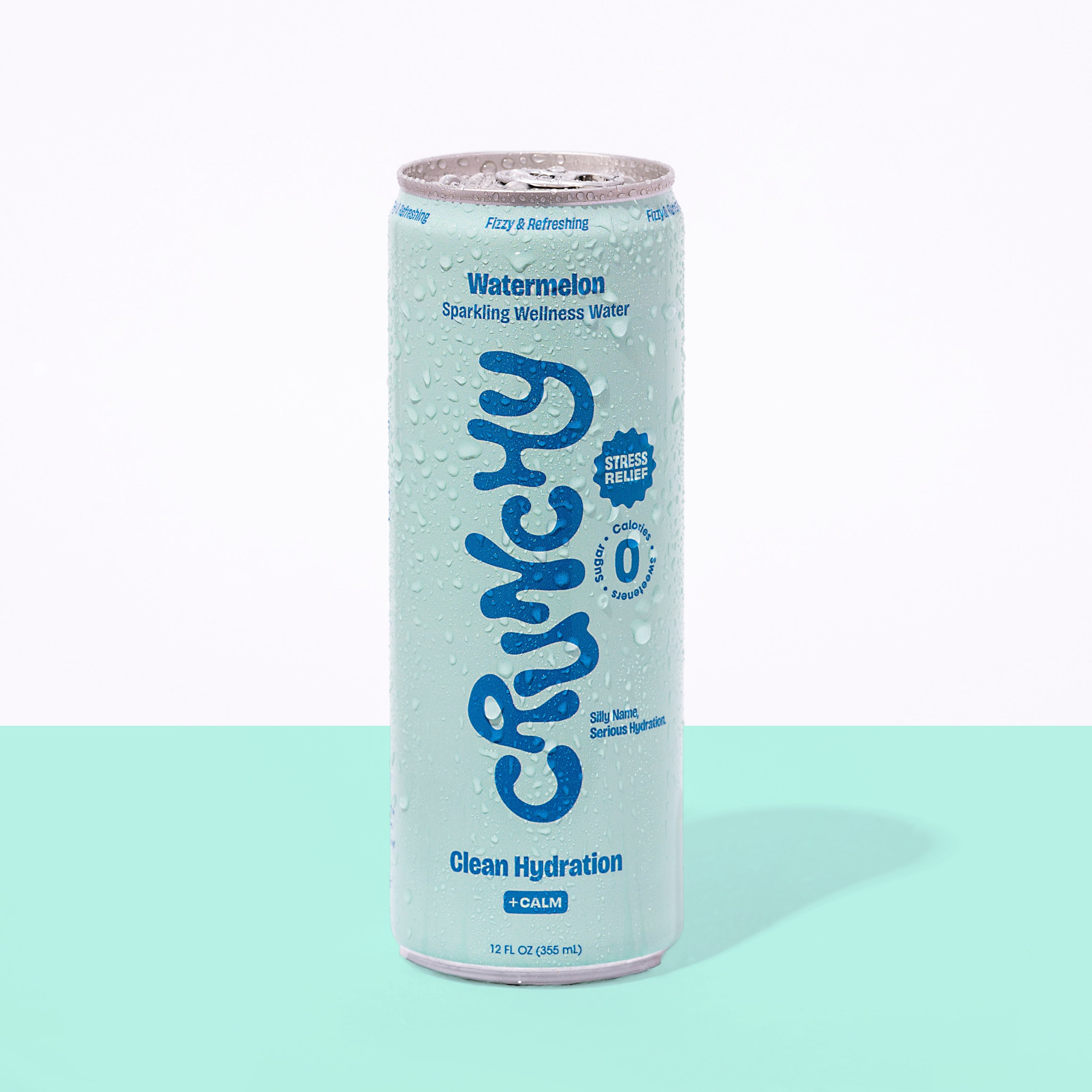 Can of Crunchy sparkling wellness water on a light blue background