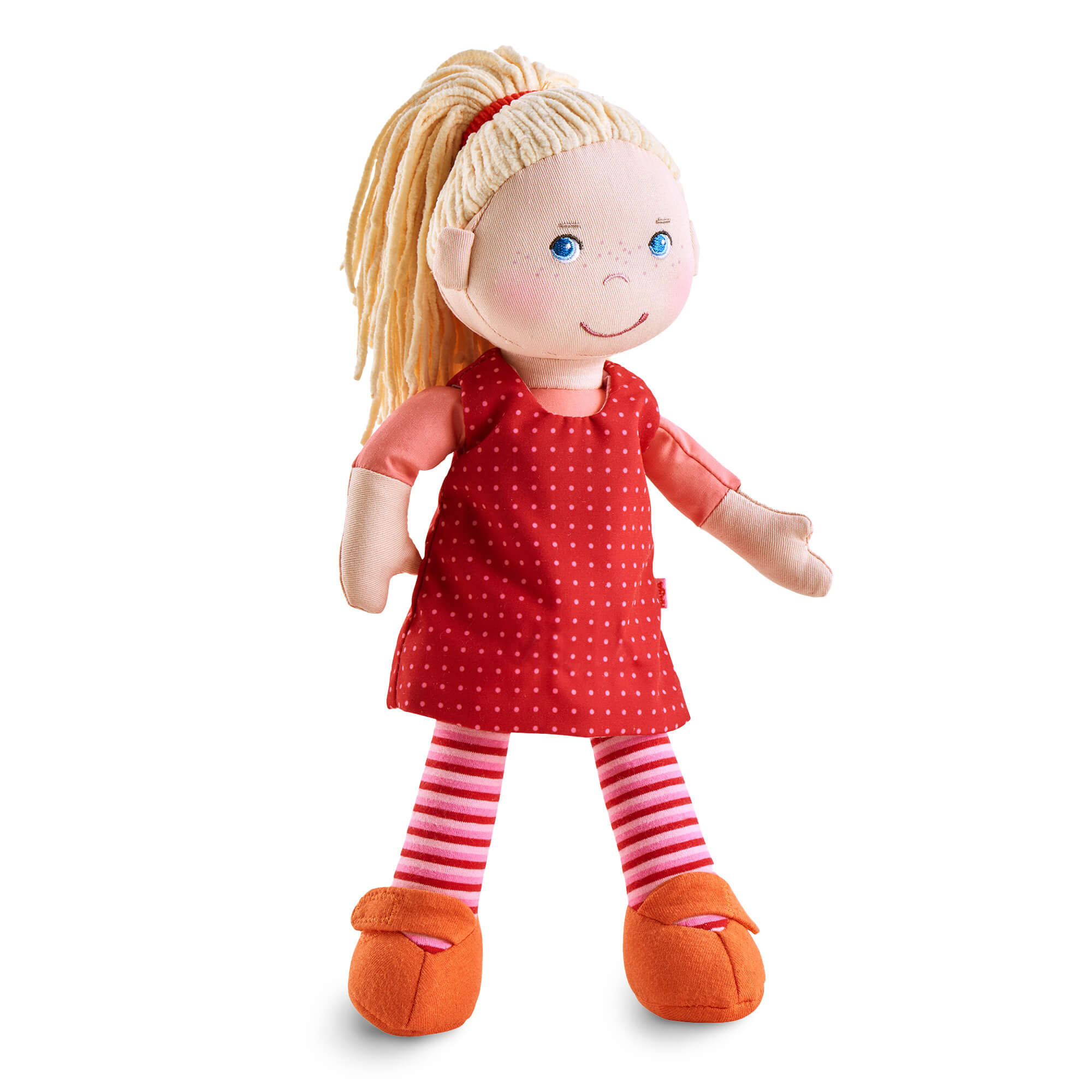 Plush doll with blonde hair, red dress, and striped leggings on a white background