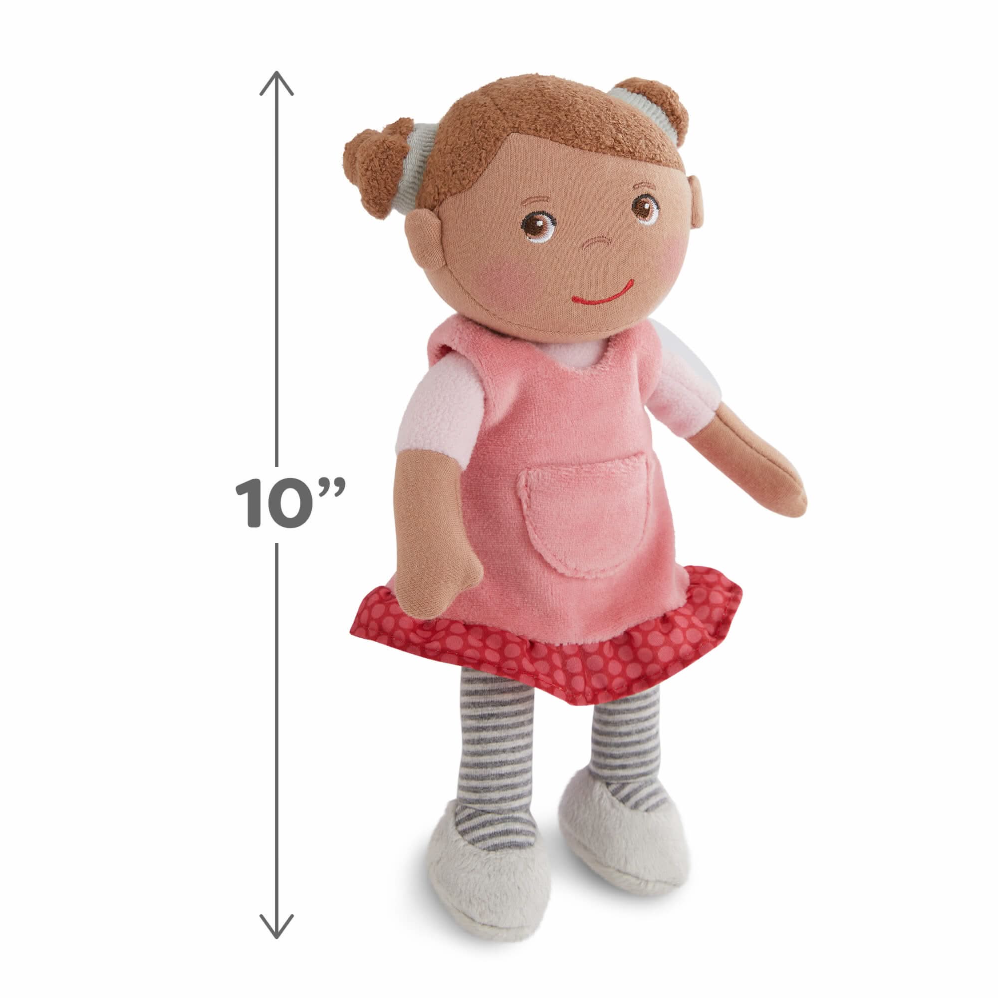 Stuffed doll with a pink dress and red skirt, standing next to a measurement label indicating its height.
