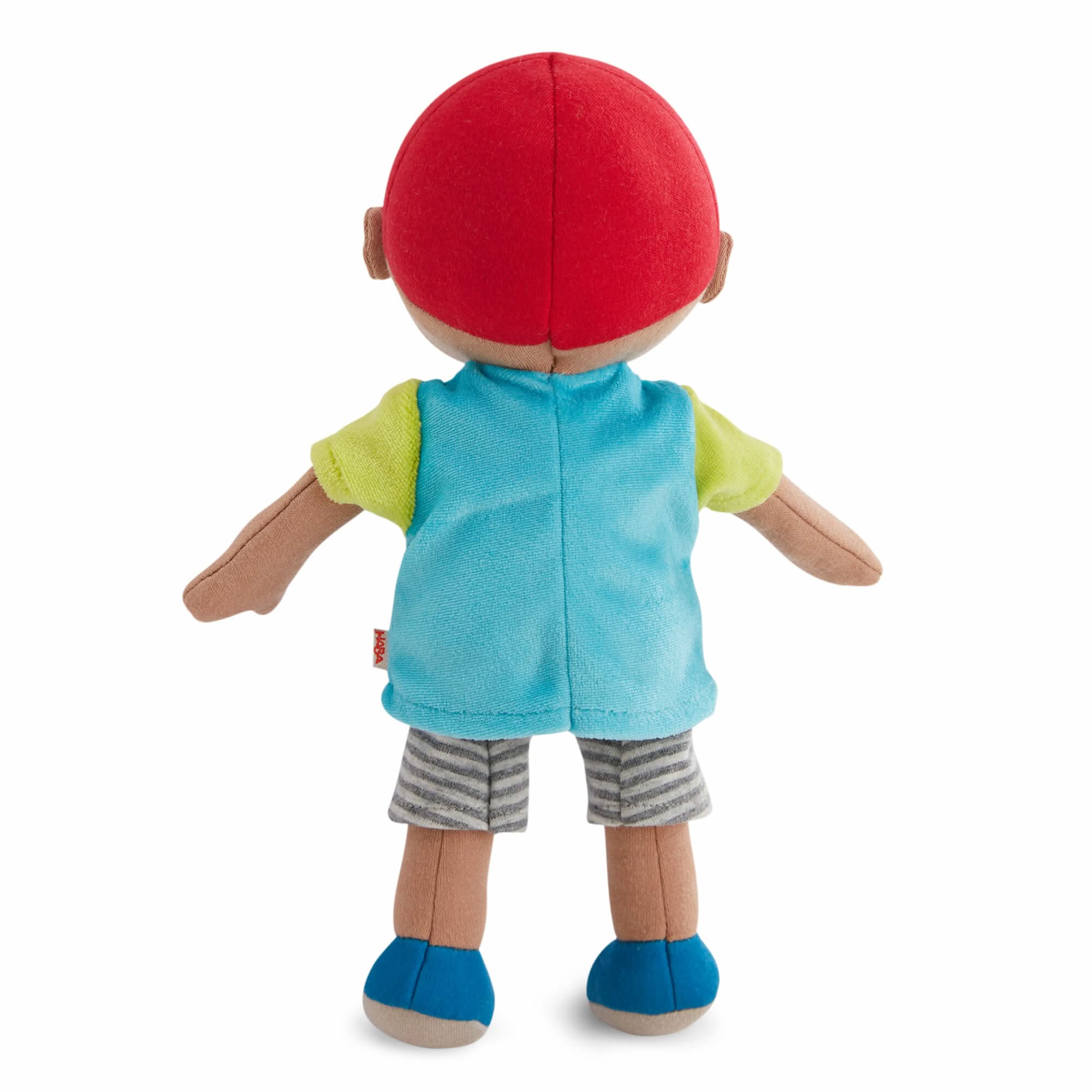 Plush toy with a red hat, blue shirt, green sleeves, gray shorts, and blue shoes on a white background