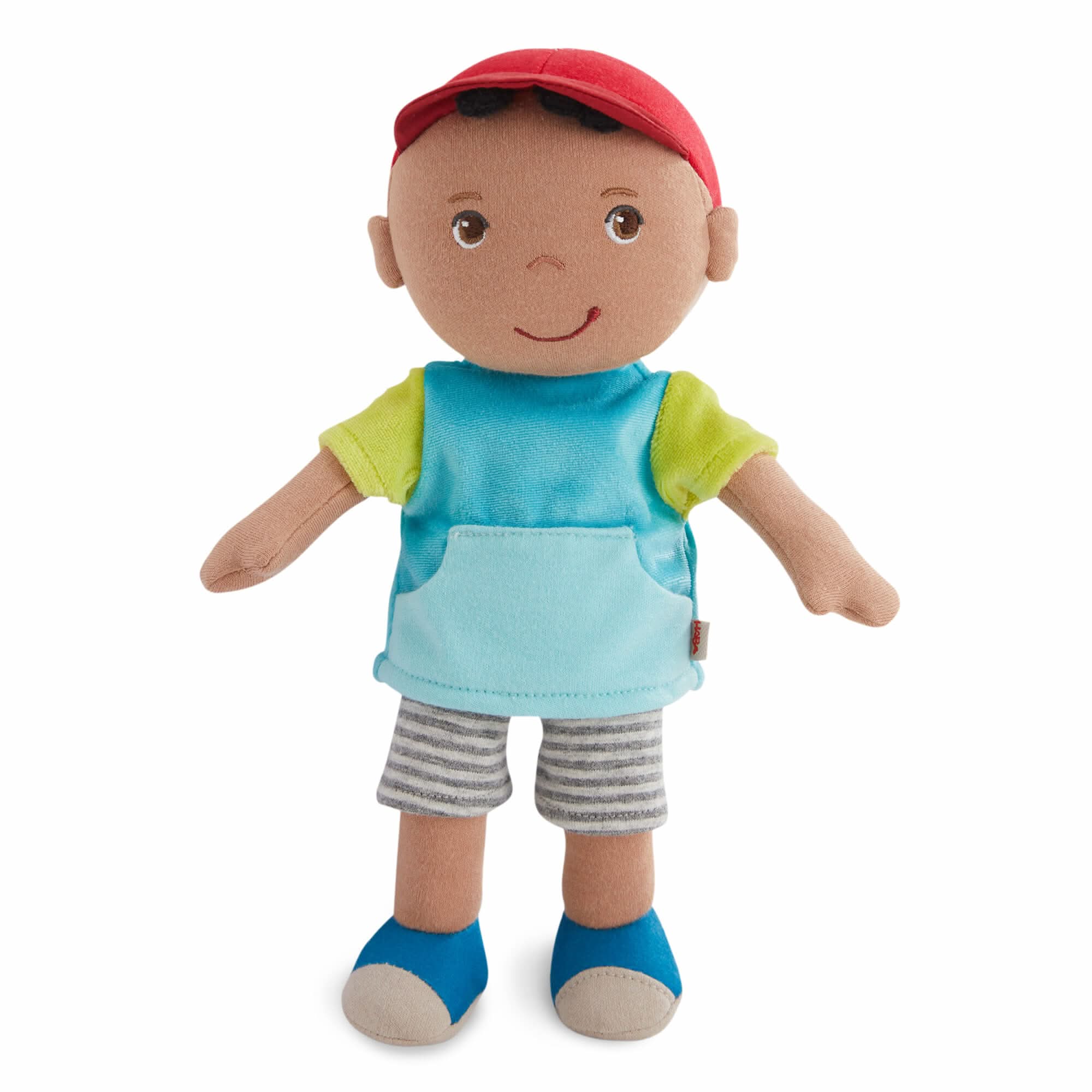 Plush toy doll with a red cap, blue shirt, and gray shorts on a white background