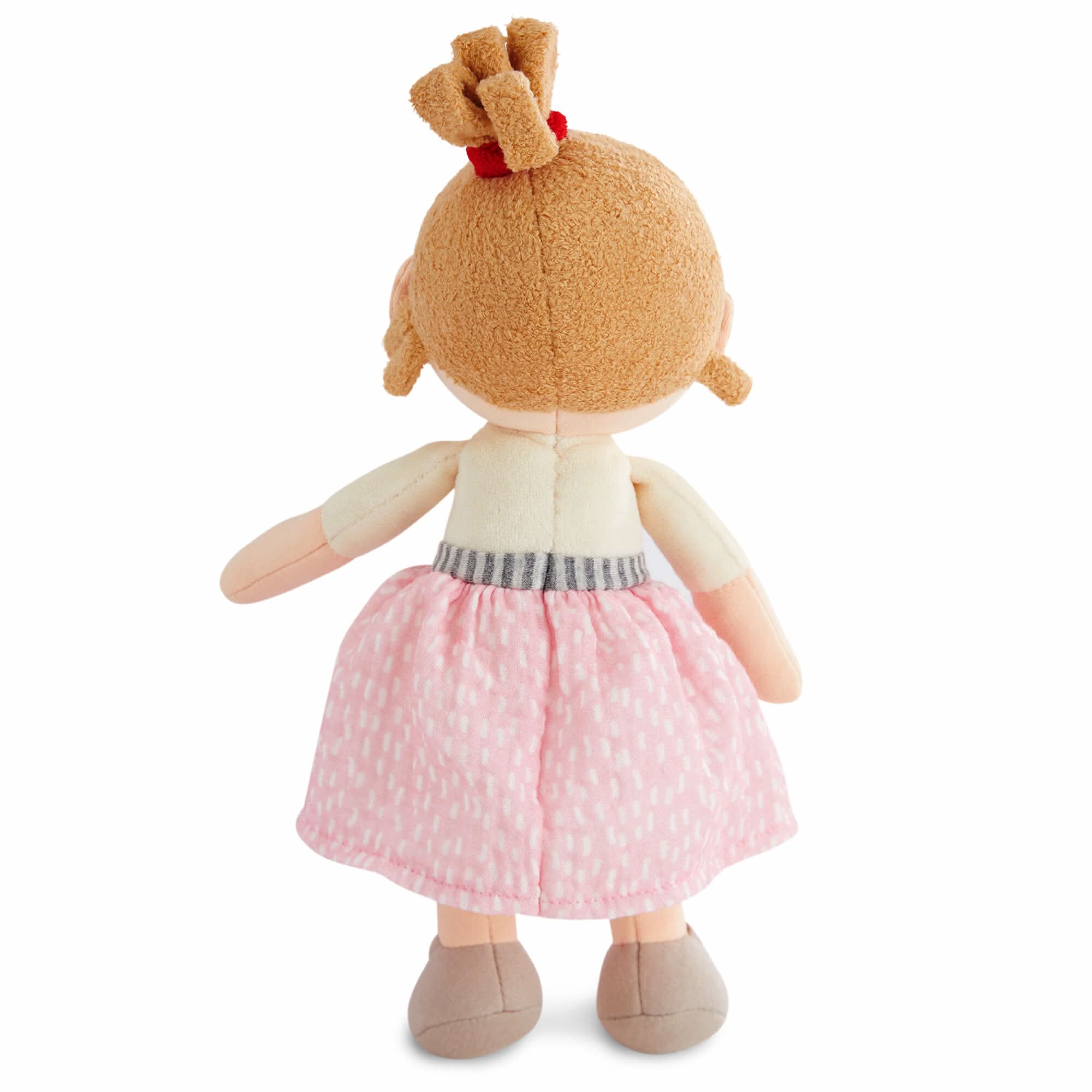 Plush toy with a brown head and pink dress on a white background