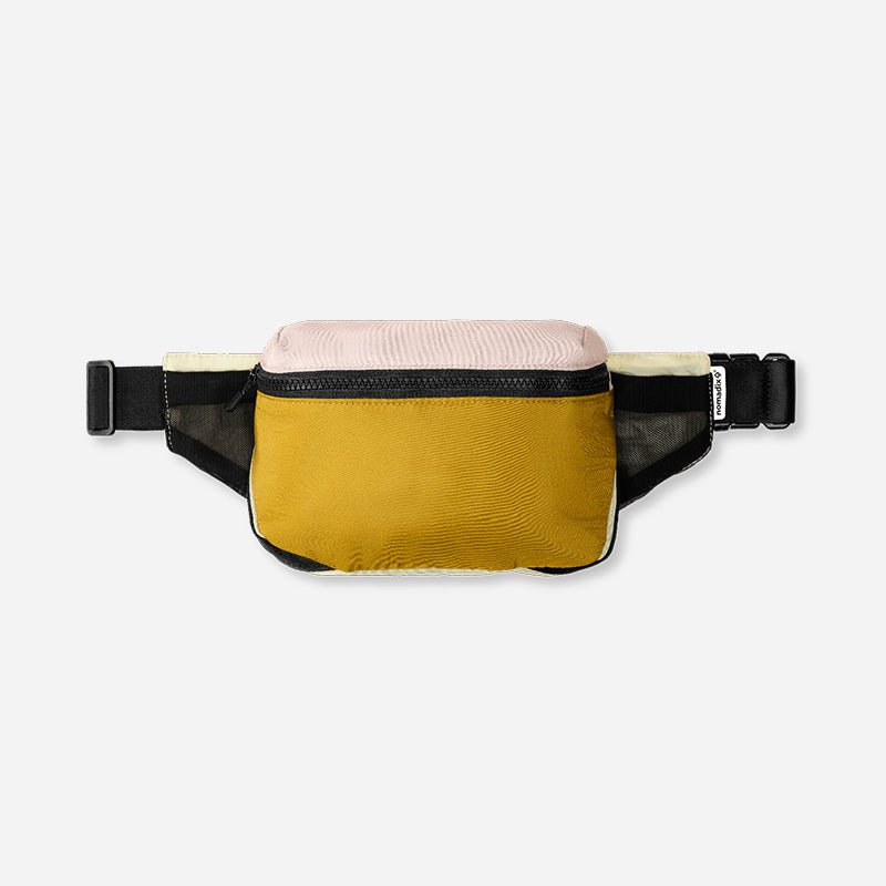 Yellow waist bag with a pink top on a white background
