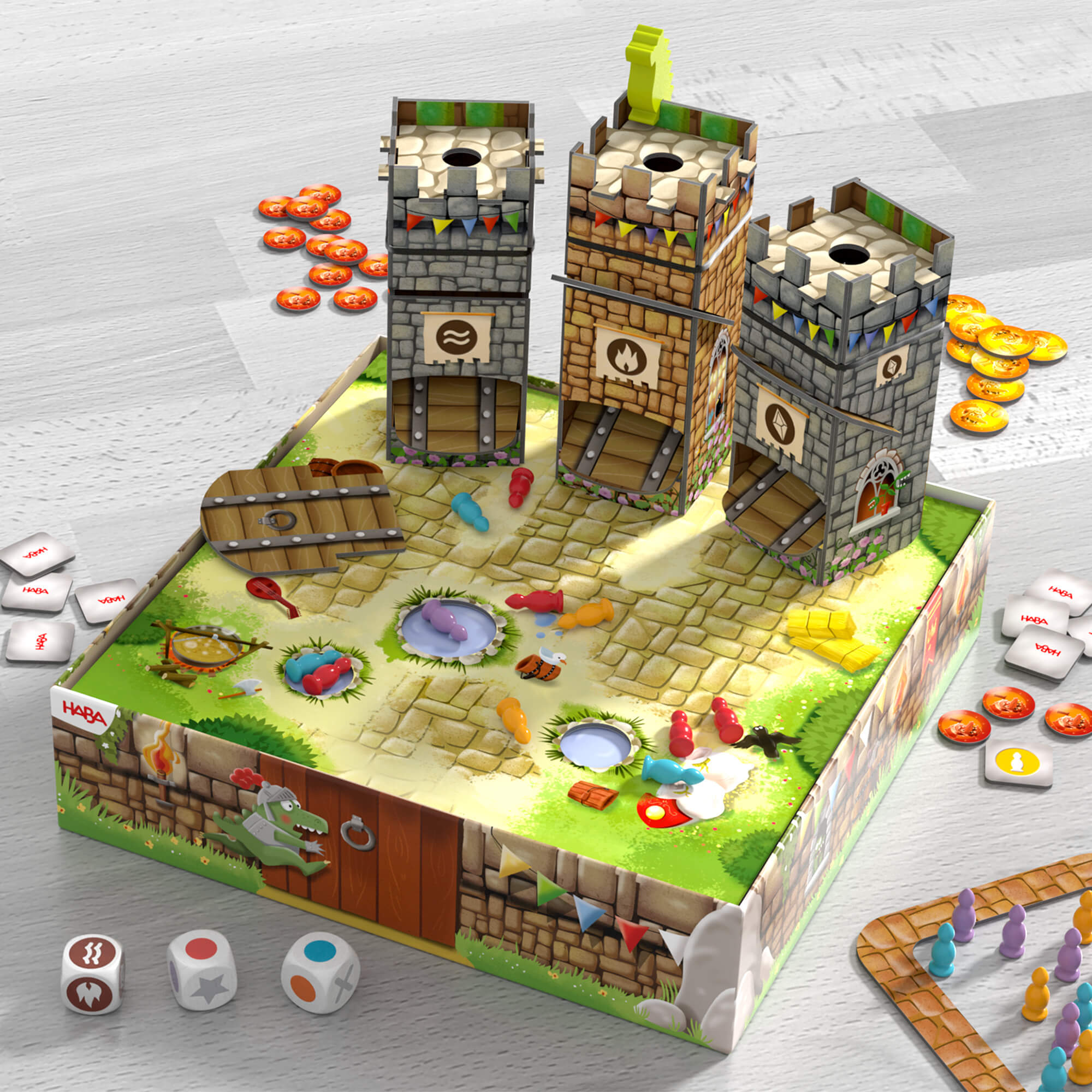 Board game set with castle-themed board and game pieces on a light gray surface