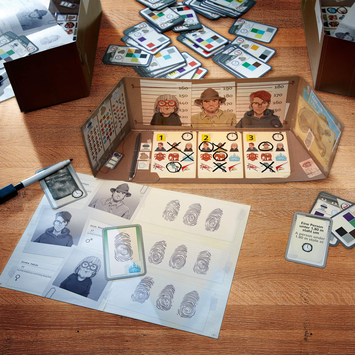 Board game with character cards and question cards on a wooden table