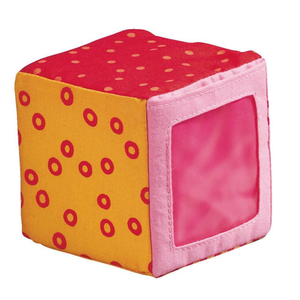 Colorful cube-shaped pet bed with red polka dots on a white background