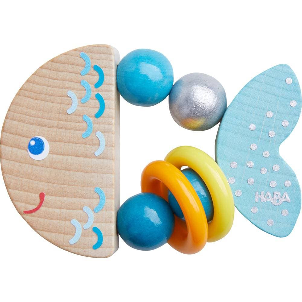 Colorful baby toy with wooden and plastic elements on a white background
