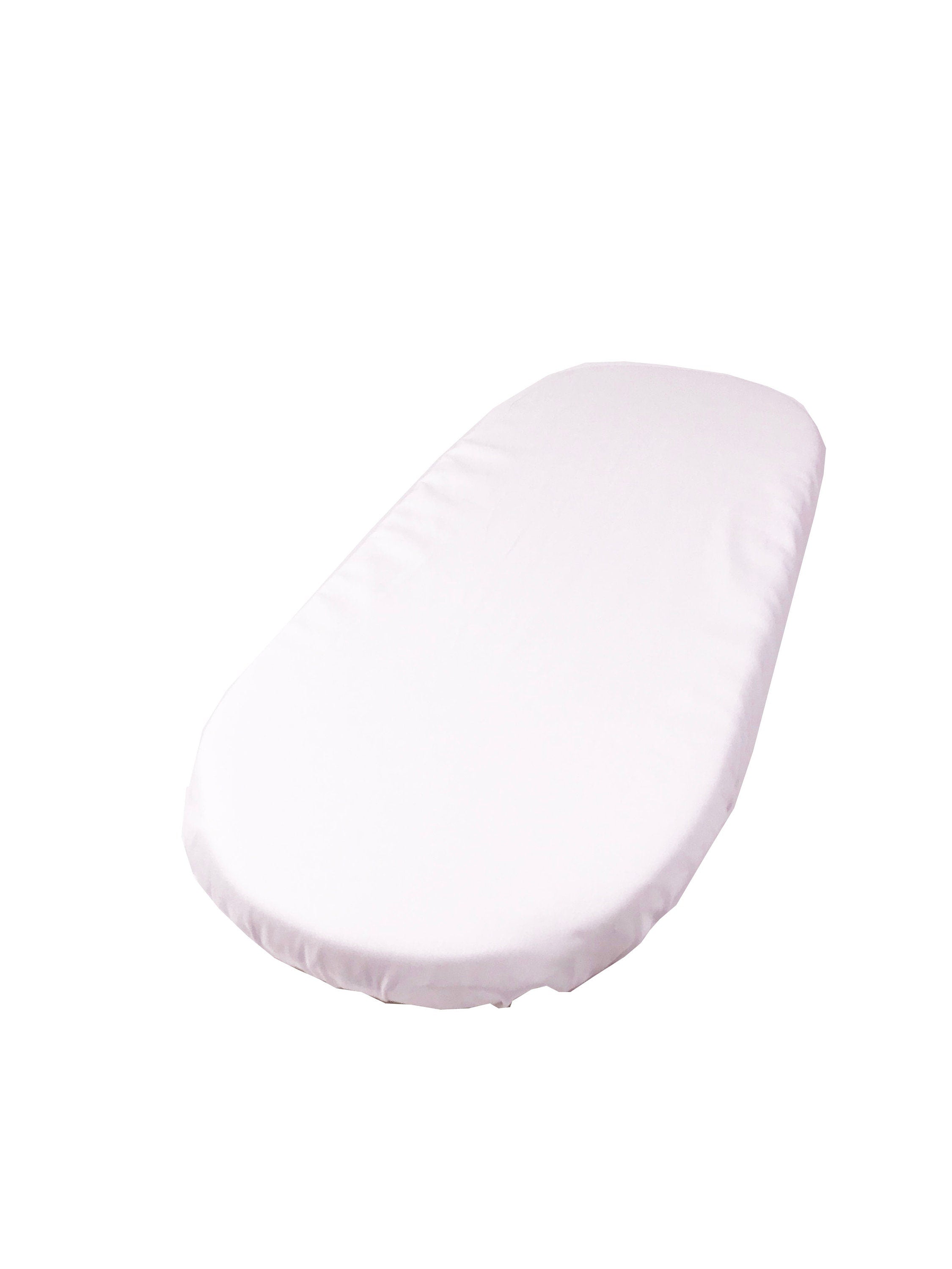 White baby changing table cover on a white background