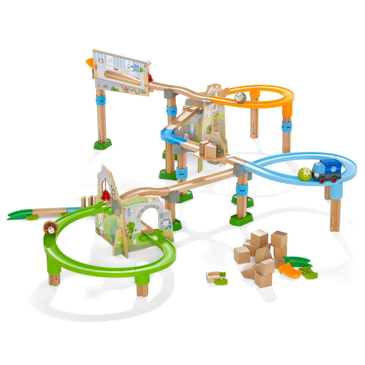 Toy marble run track set with various tracks and accessories on a white background