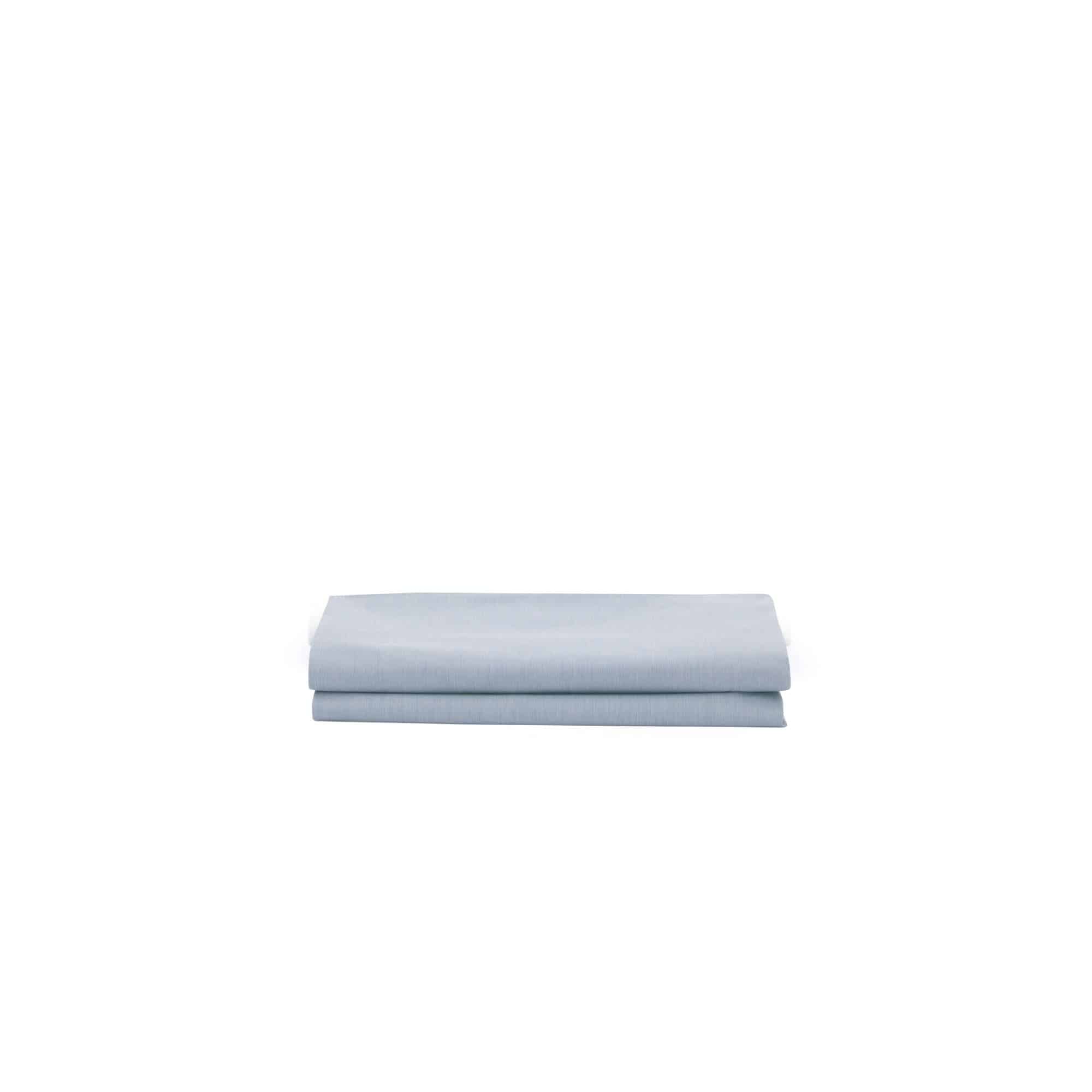 Light blue fabric roll on a white background
