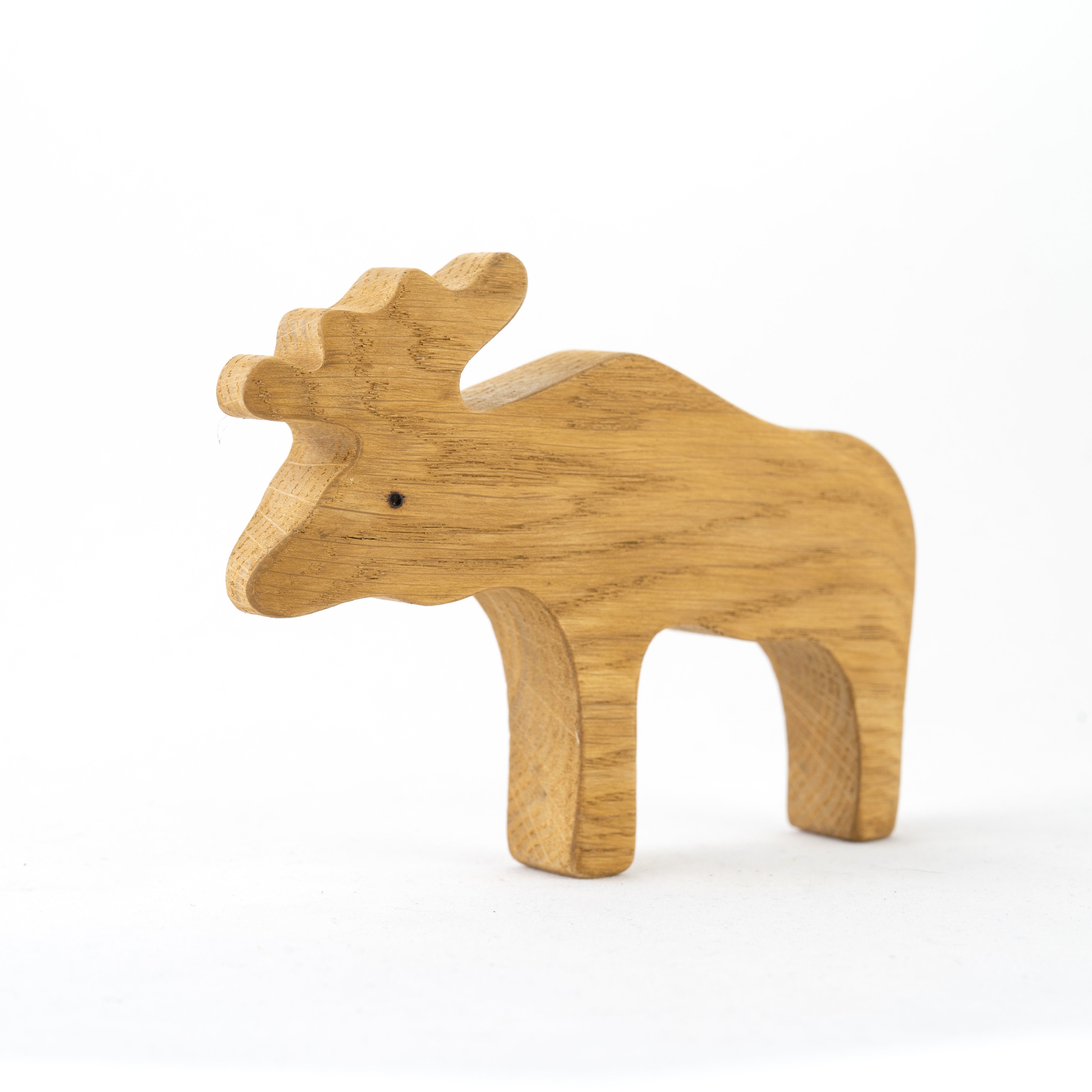 Wooden moose figurine on a white background
