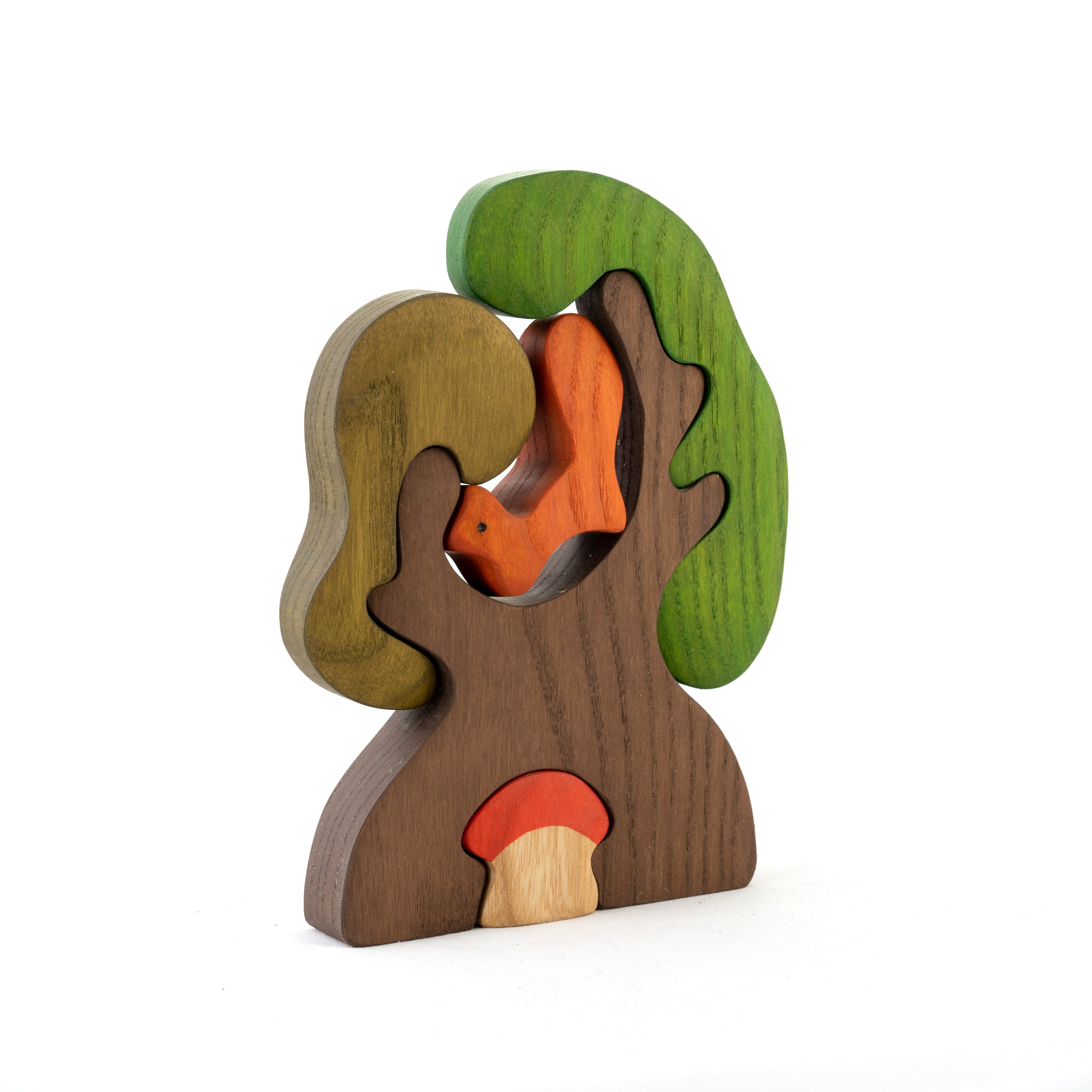 Wooden toy with a tree and squirrel design on a white background