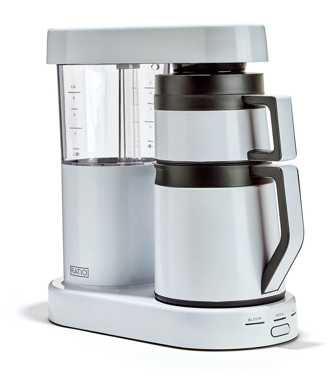 White coffee maker with black accents on a white background