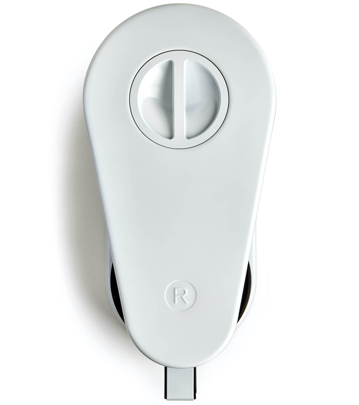 White electronic device with a central dial on a white background