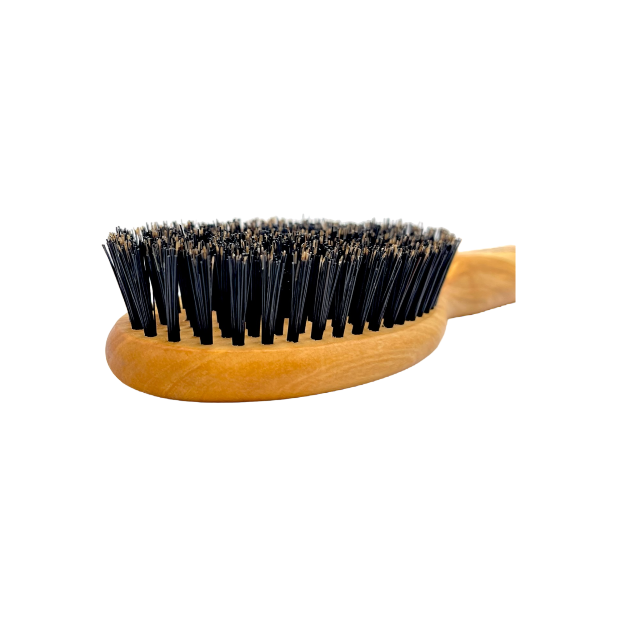 Wooden hairbrush with black bristles on a white background