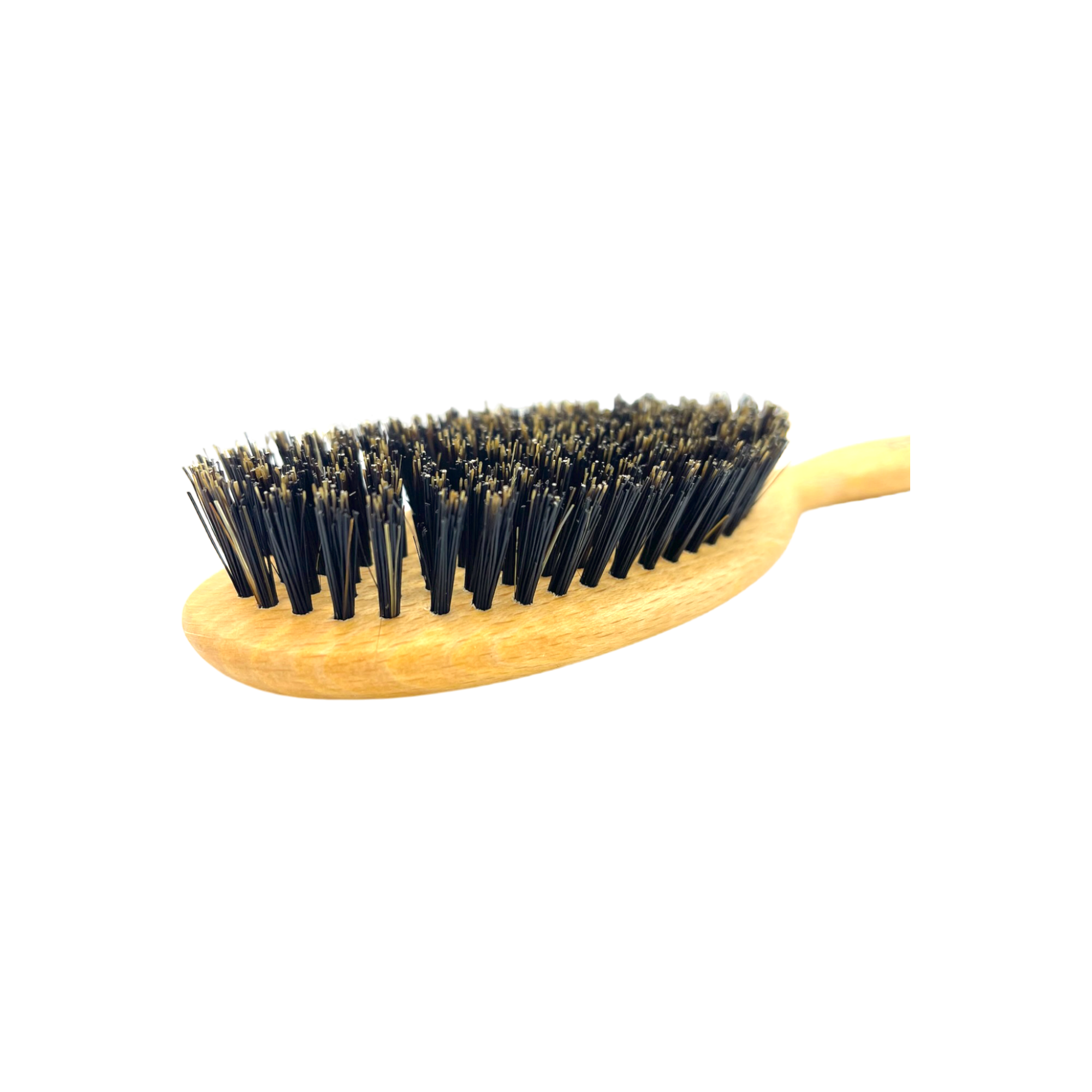 Wooden brush with black bristles on a white background