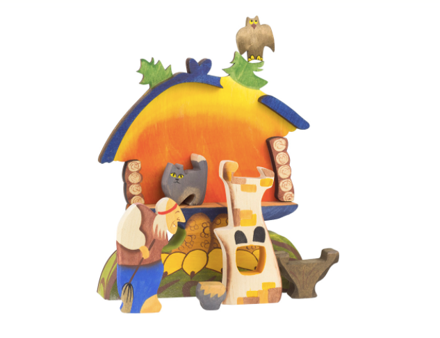 Colorful wooden sculpture of a house with animals on a white background