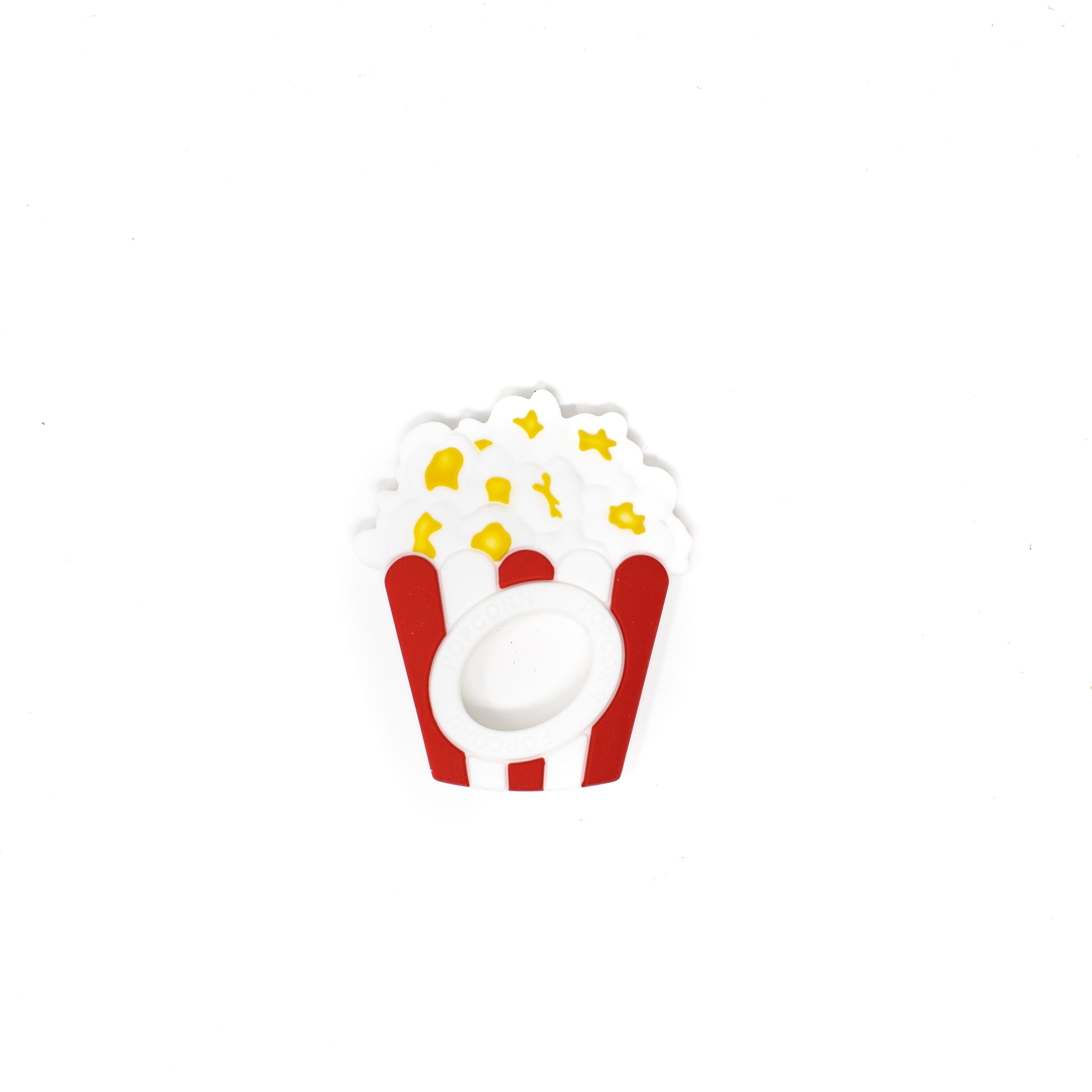 Popcorn container with yellow kernels on a white background