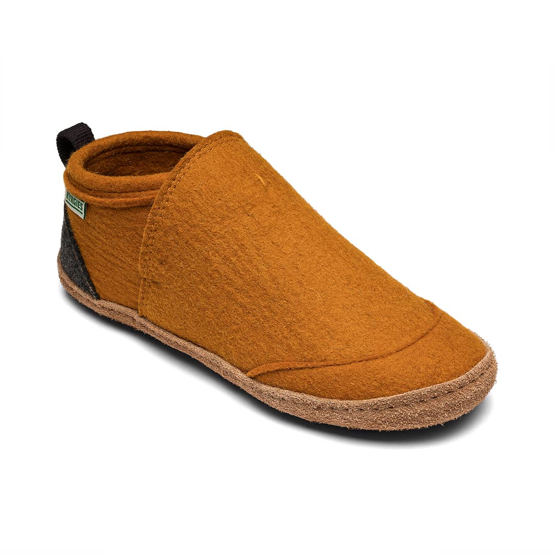 Brown slip-on shoe with a visible brand logo on a white background