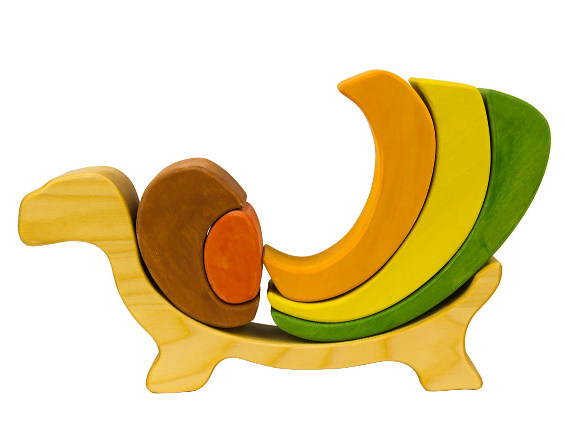 Wooden toy banana set on a white background