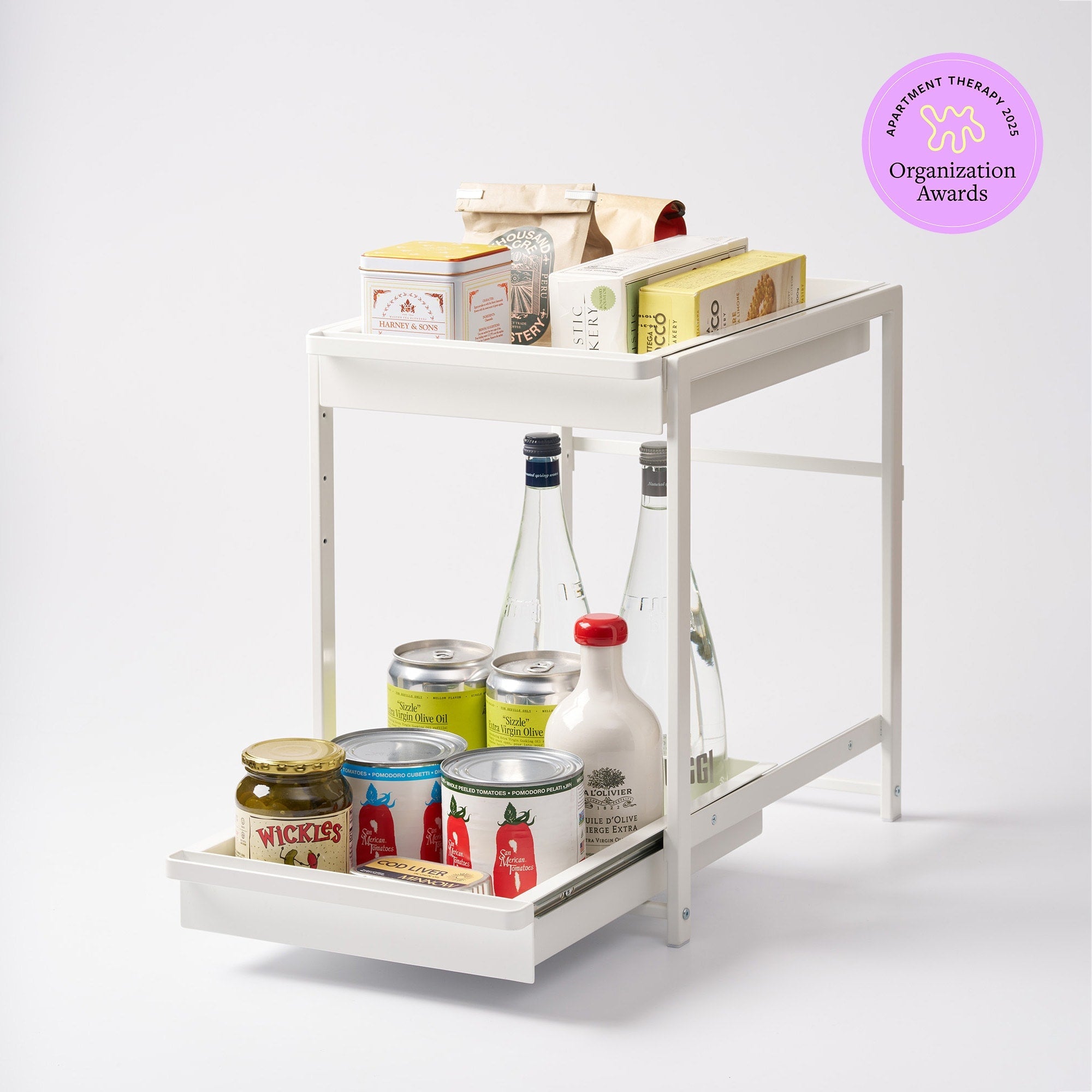White kitchen cart with food items on a white background