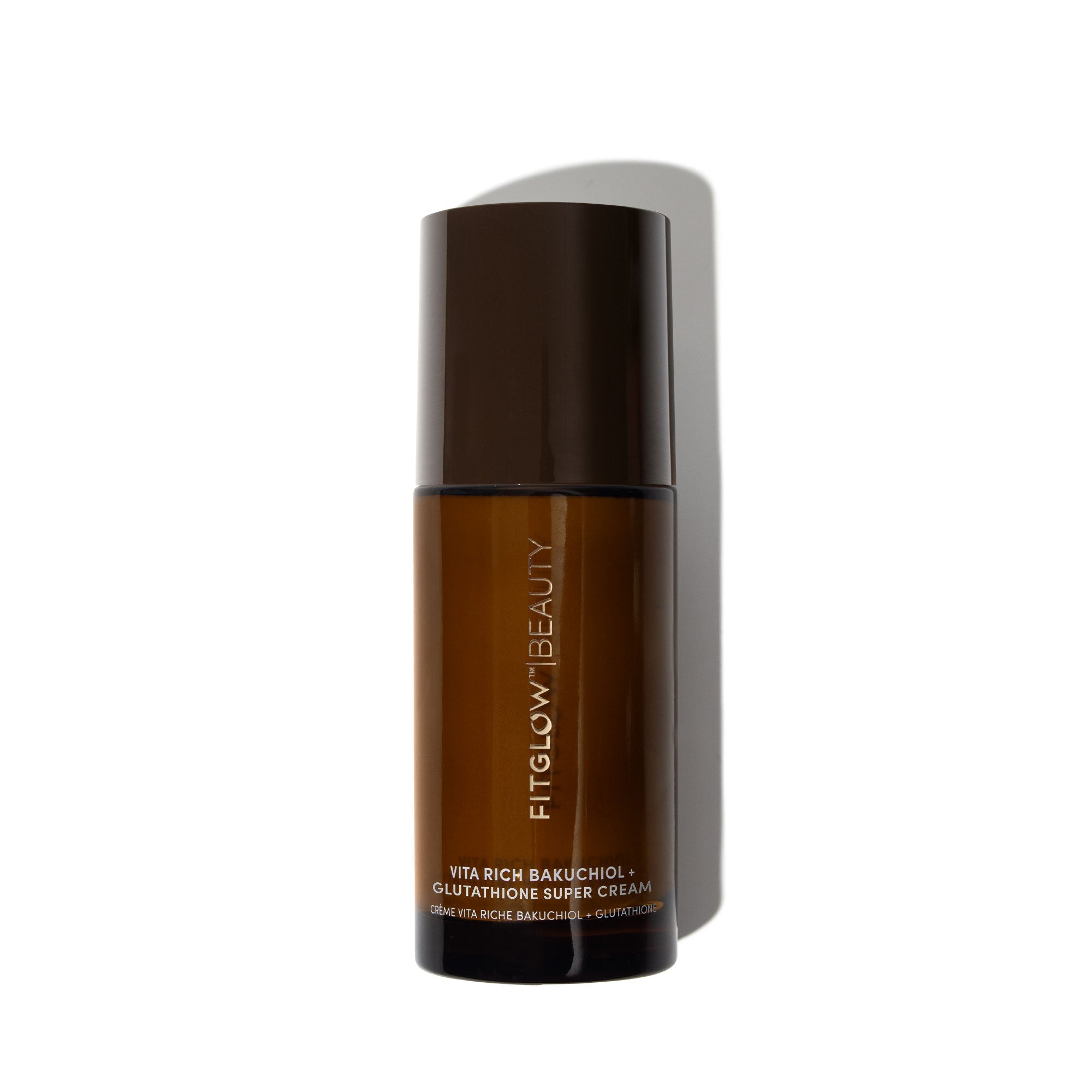 Brown skincare bottle with 'Fitglow Beauty' branding on a white background