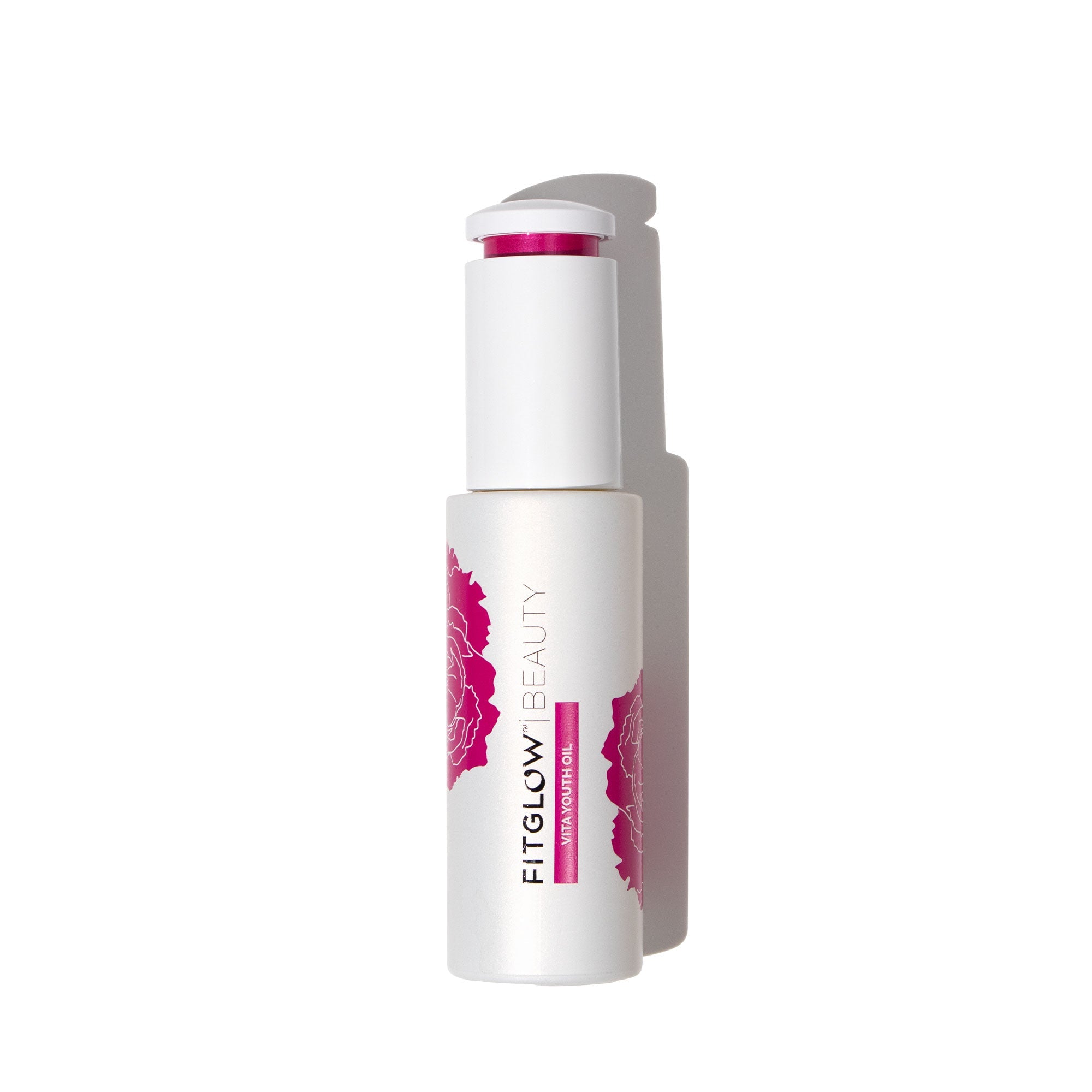 White skincare product with pink floral design on a white background