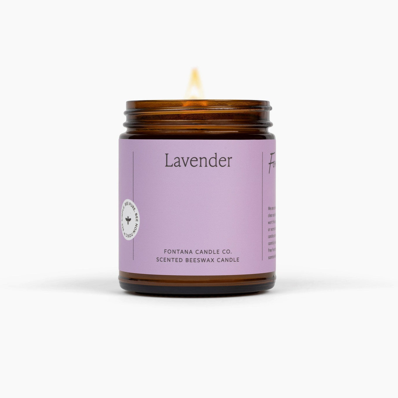Lavender candle with a purple label on a white background