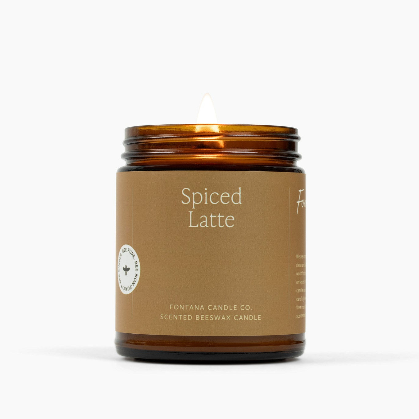 Beeswax candle labeled 'Spiced Latte' by Fontana Candle Co. on a white background