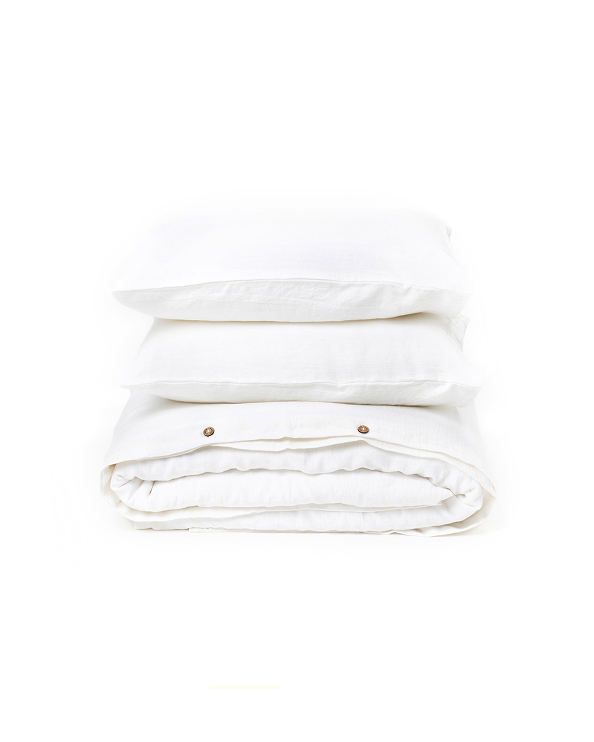 Stack of white towels on a white background