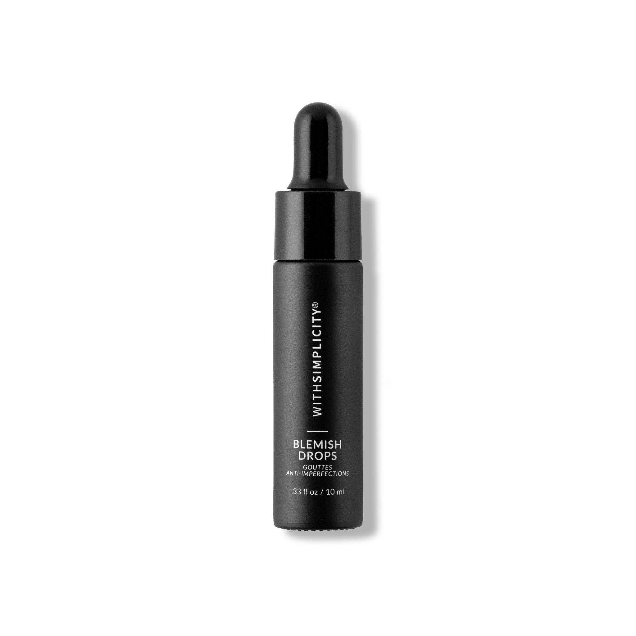 Black skincare dropper bottle with 'WITHIN' branding on a white background