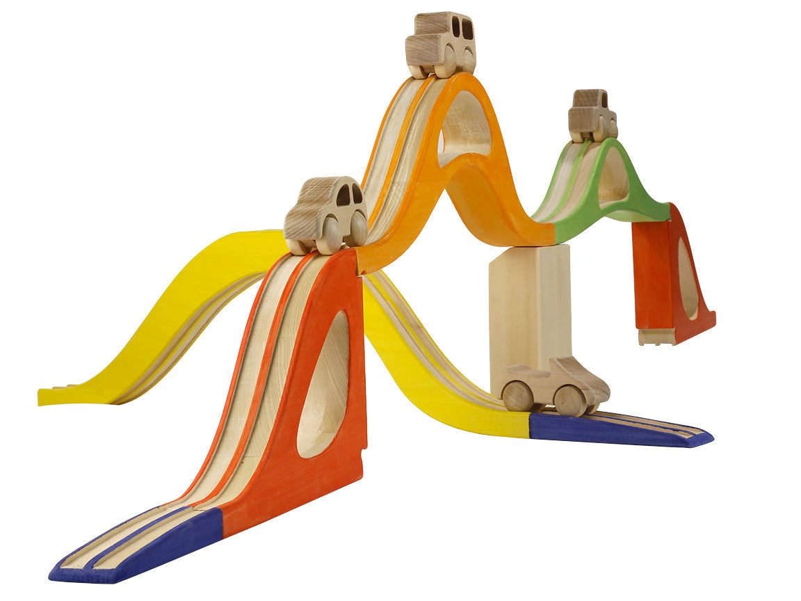 Colorful wooden toy track with cars on a white background