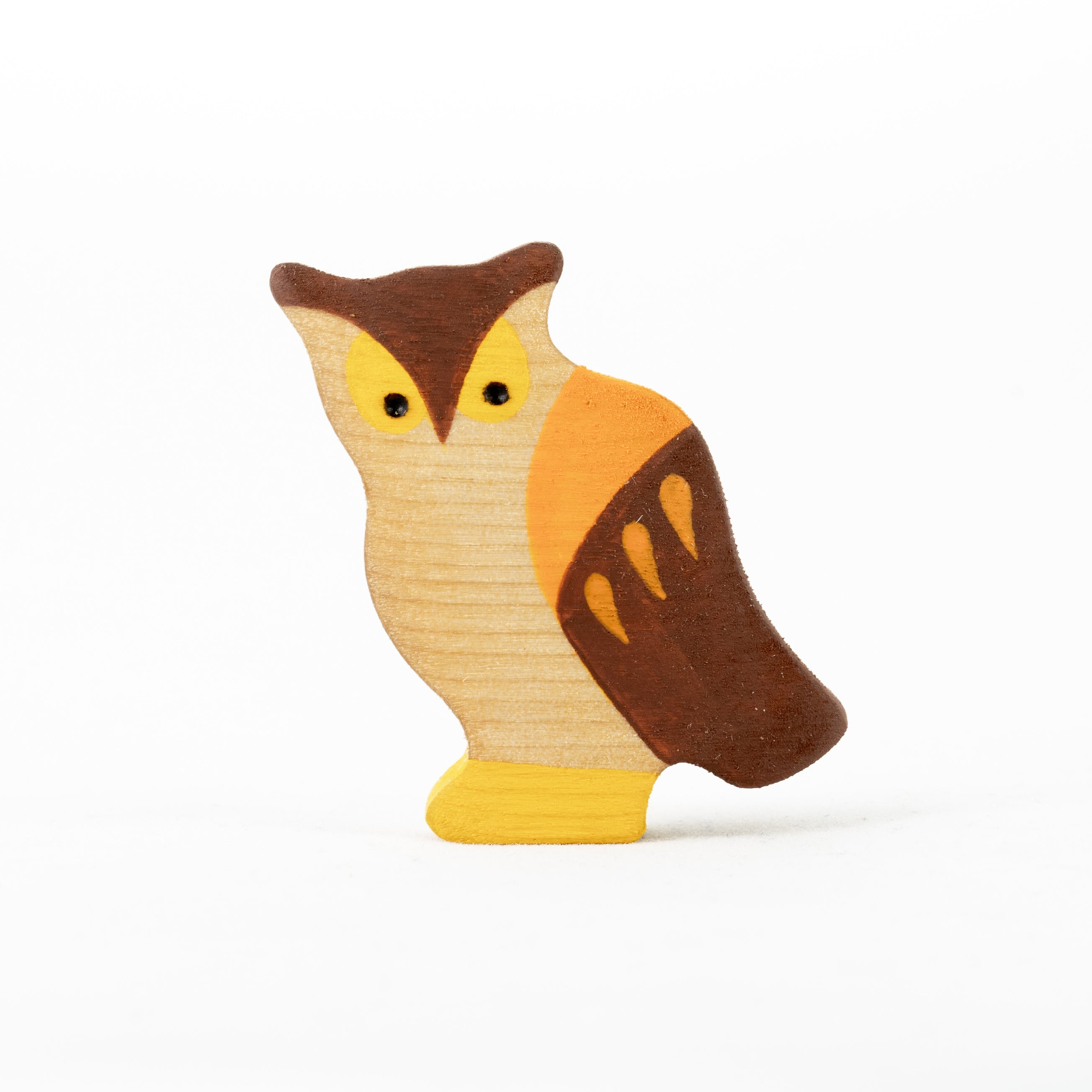 Wooden owl toy on a white background
