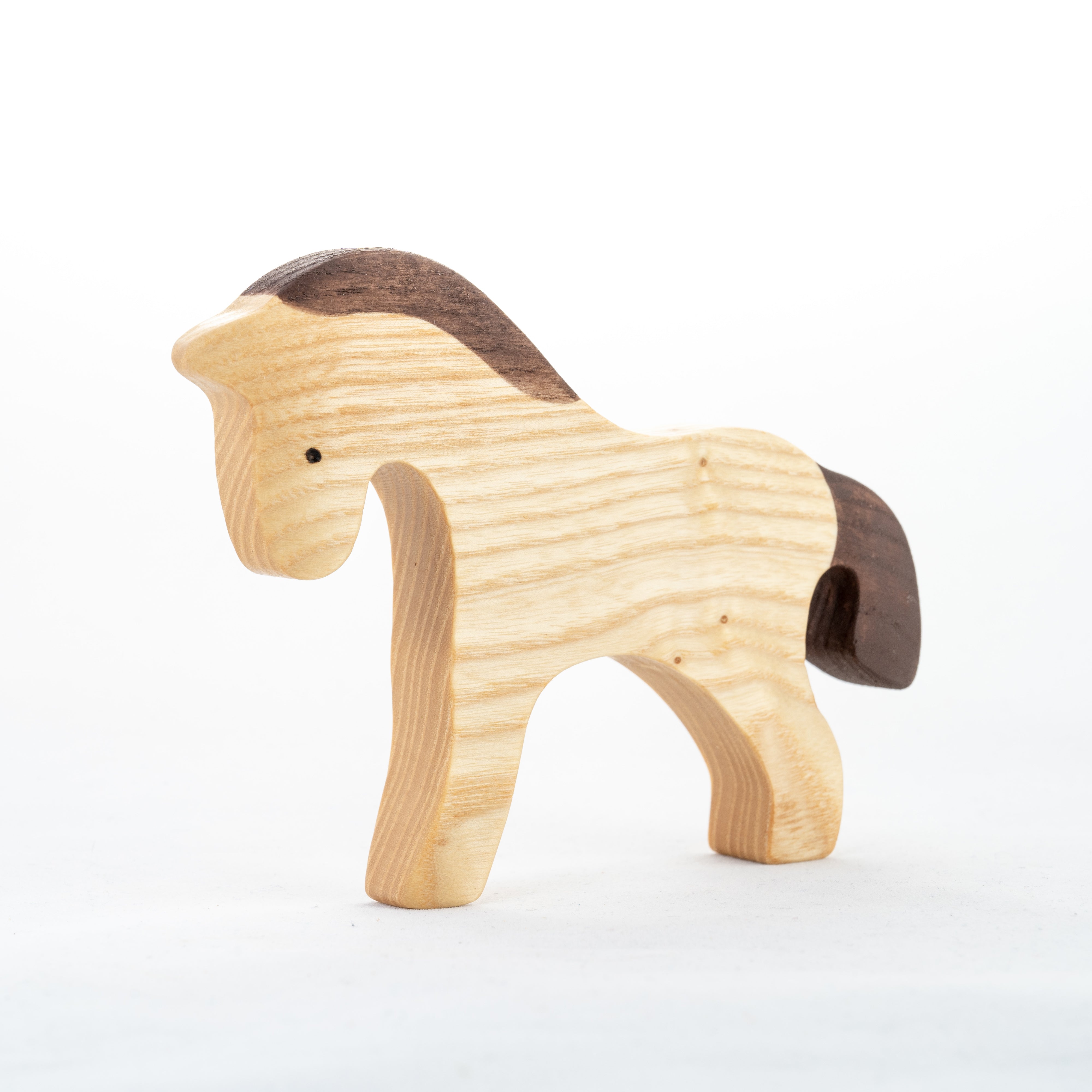 Wooden horse toy on a white background