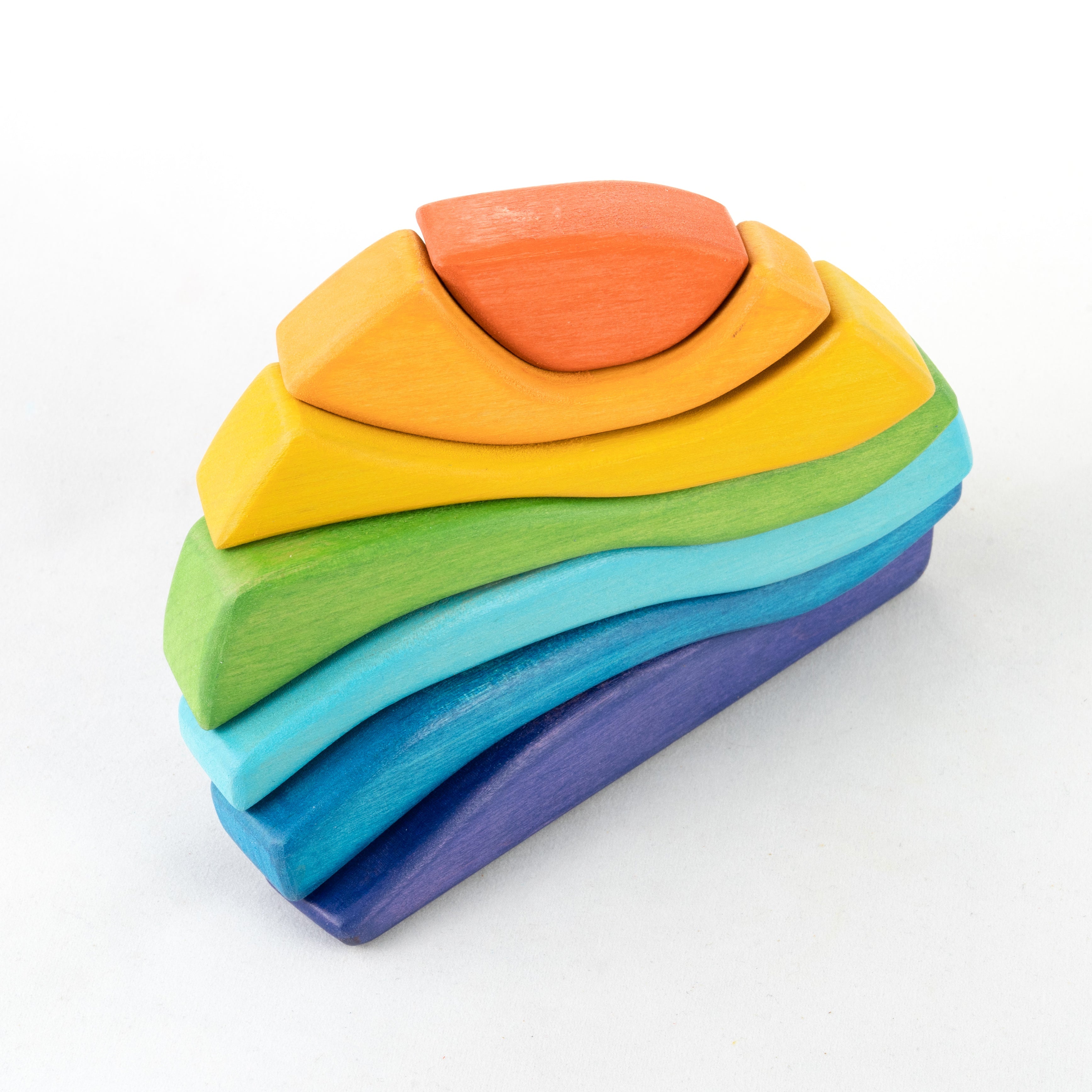 Colorful wooden toy resembling a rock on a white background