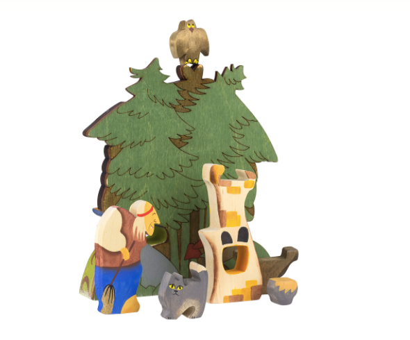 Wooden figurine set with trees, animals, and a character on a white background