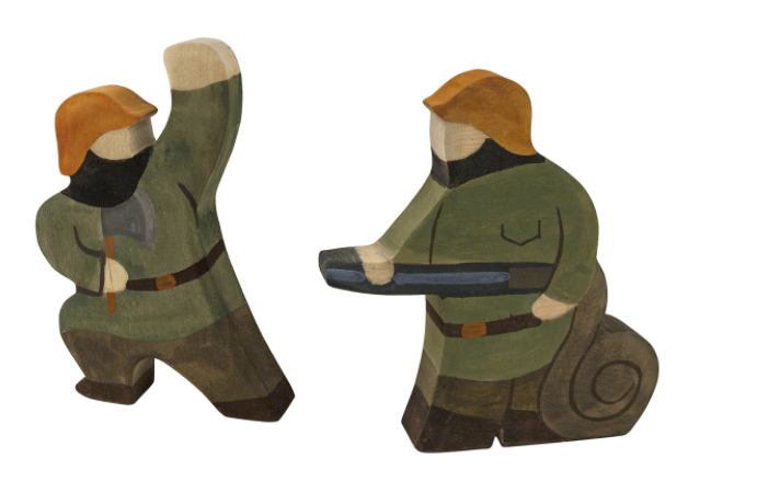 Wooden figurines of two people in green uniforms and brown hats, one holding a weapon, on a white background.