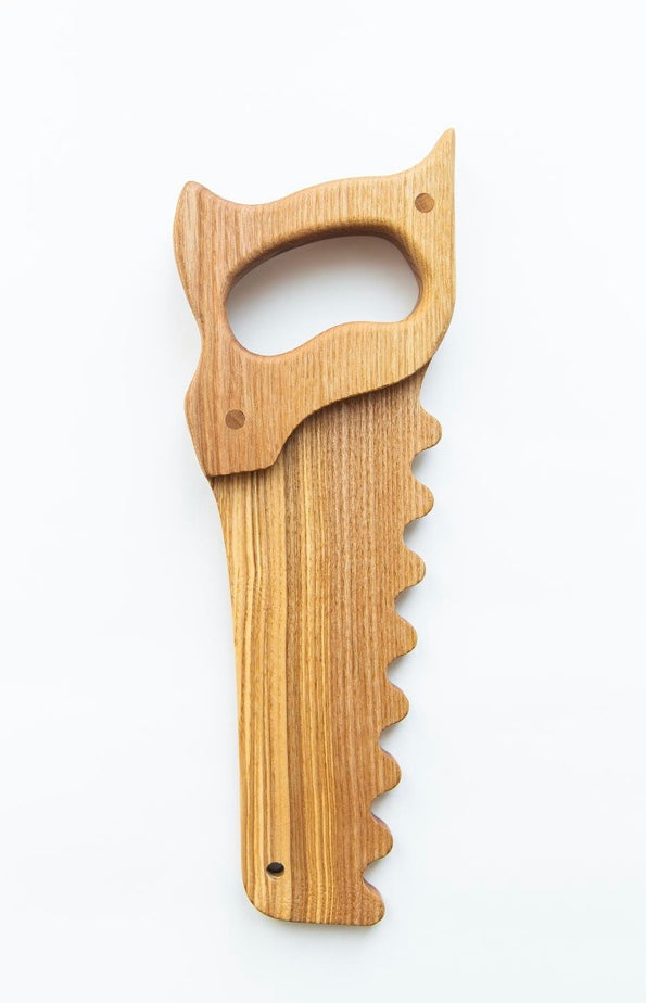 Wooden tool with a unique design on a white background