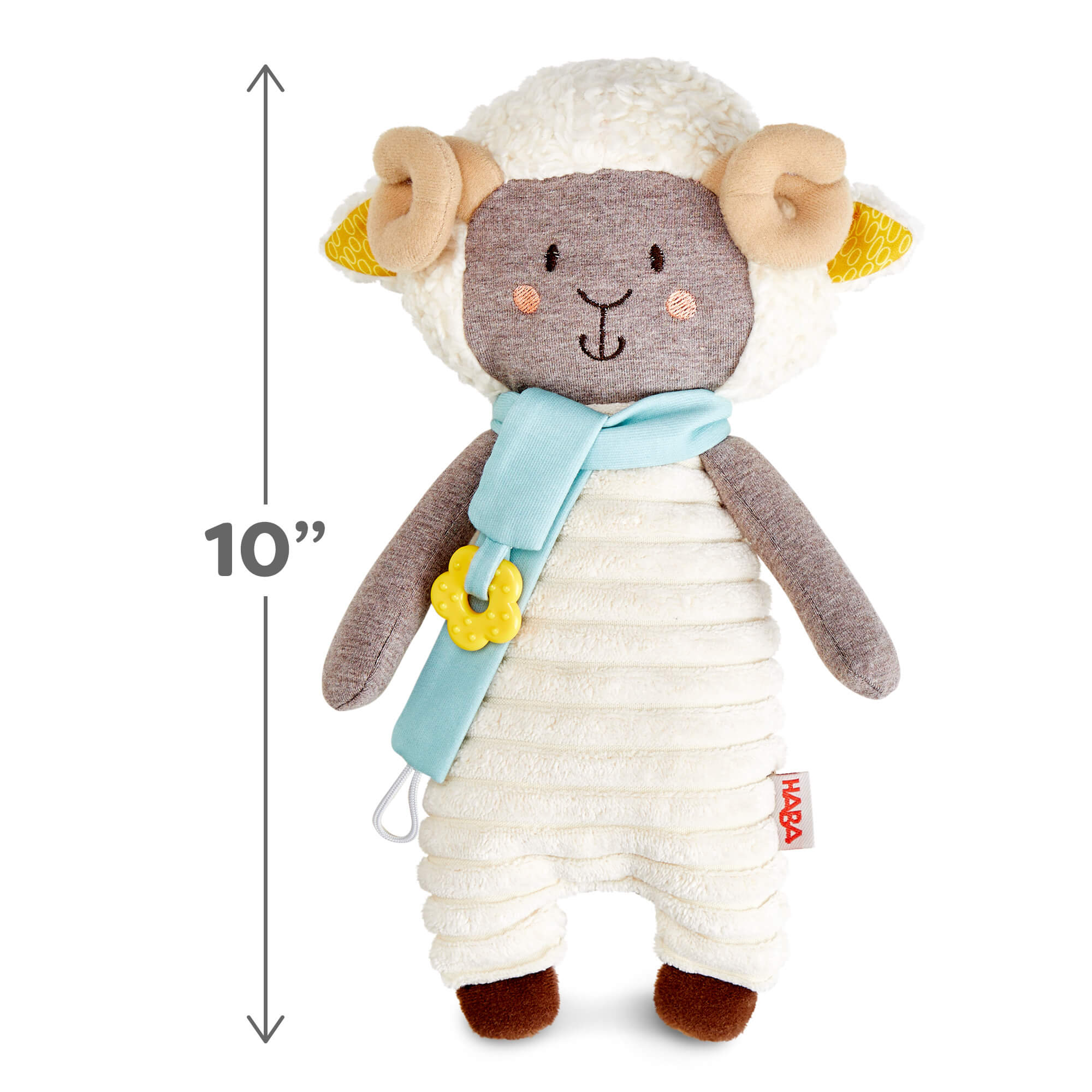 Plush toy sheep with measurements on a white background