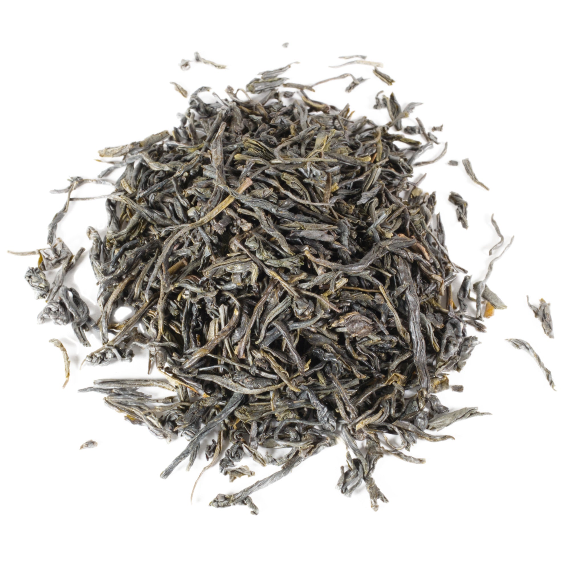Dry tea leaves on a white background