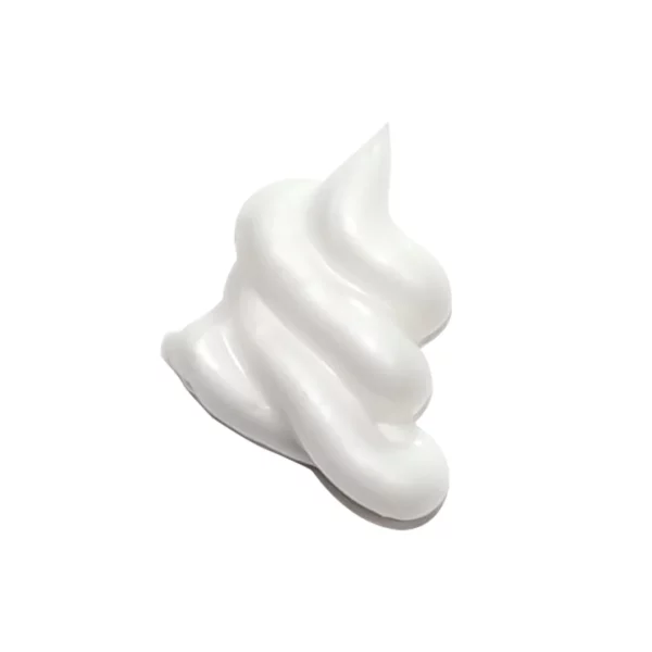 A dab of Acure Seriously Soothing Cleansing Cream on a white background. Resembles a cloud.