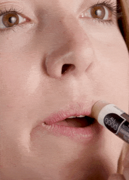 An animated image of a woman applying organic lip balm and smiling