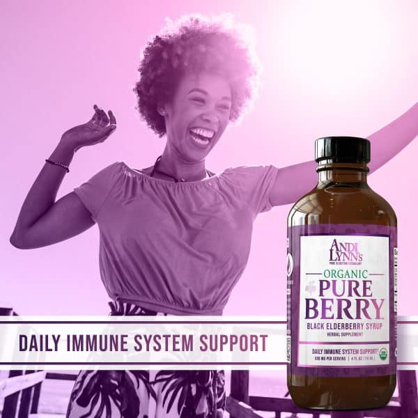 An image of a laughing woman and daily immune support banner next to a bottle of Andi Lynn's - Pure Black Elderberry Syrup