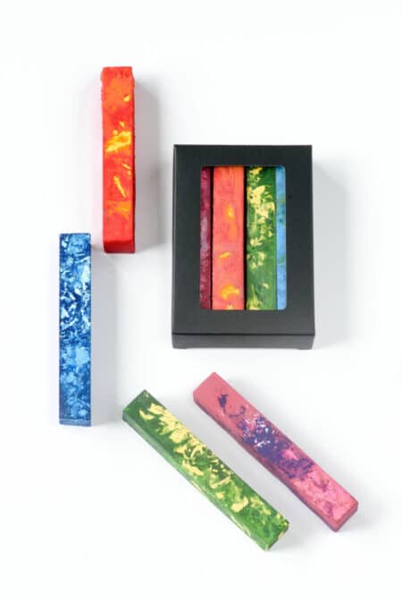 A set of Eco-Kids Marble Beeswax Crayon Sticks