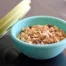 A blue silicone bowl filled with granola.