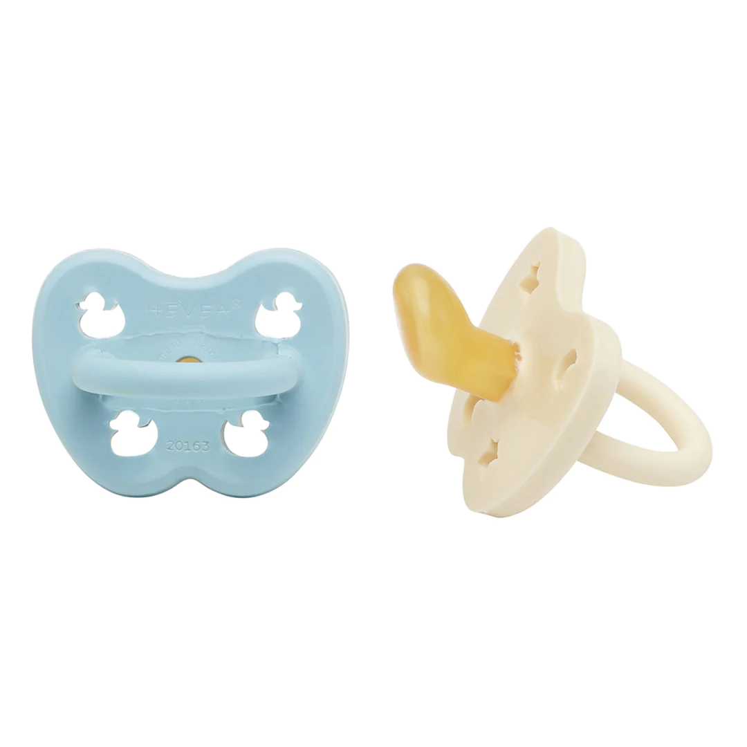 An image of 2 natural rubber pacifiers. One blue and one white.