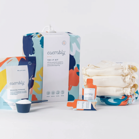 A collection of items including diaper balm and reusable diapers.