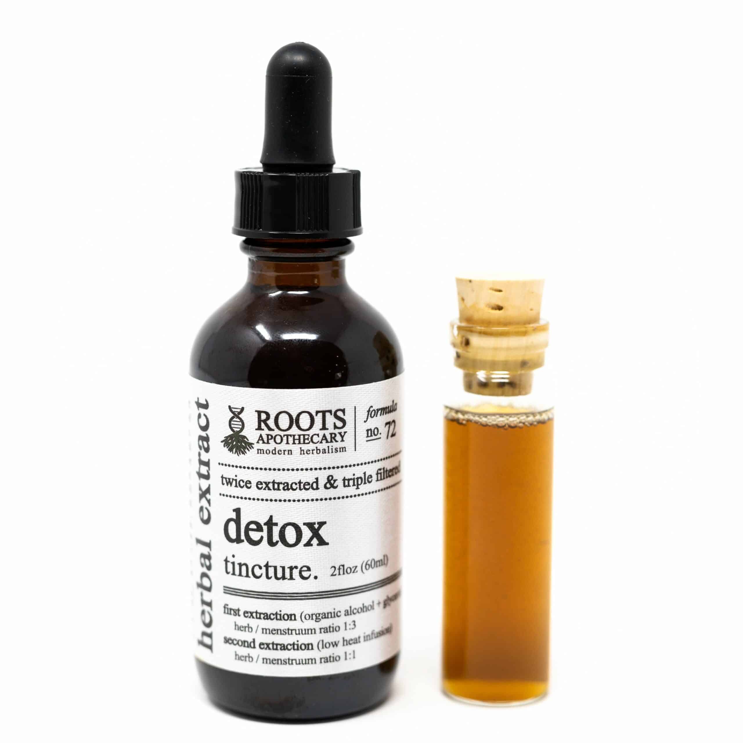 A bottle of Mushroom and Adaptogen Tincture from Root's Apothecary alongside a vial of brown liquid.
